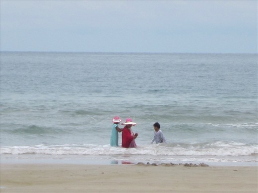 except for a few locals.  these kids were having so much fun.  however, it is so odd to see them swimming fully clothed.