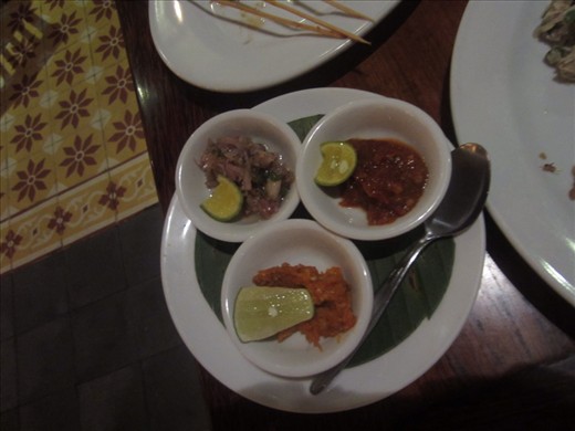 Indonesian salsas.  Top right is least spiciest, top left if medium spicy, bottom is spiciest.  And wow, they were all spicy!