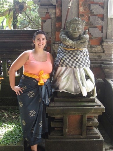 Hindu temples require you to wear a sarong and a sash.  I had shorts on so they gave me the proper garments to wear.  The statue and I now match.