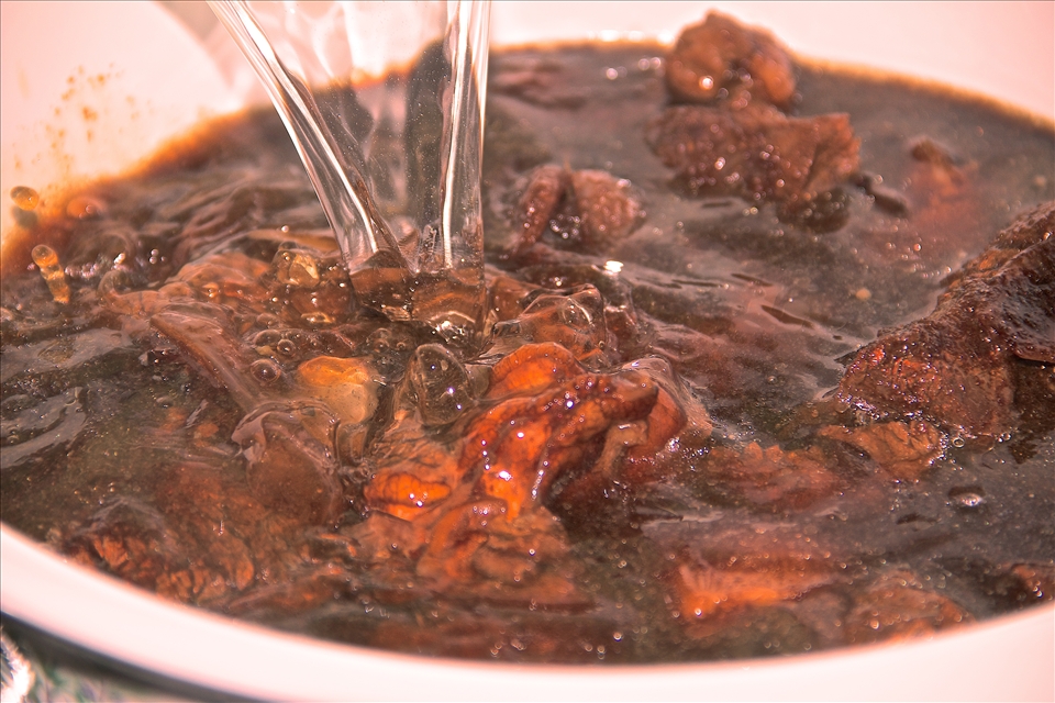 Add water to cover the meat, and let it simmer till mildly tender.