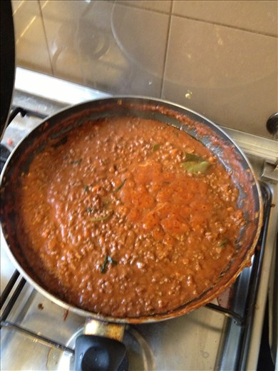 Preparing sugo alla bolognese in my apartment in Bologna. 