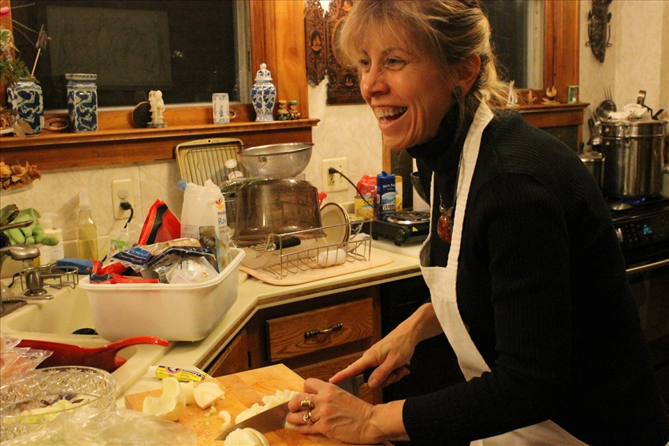 My mother cooking in our family kitchen. 