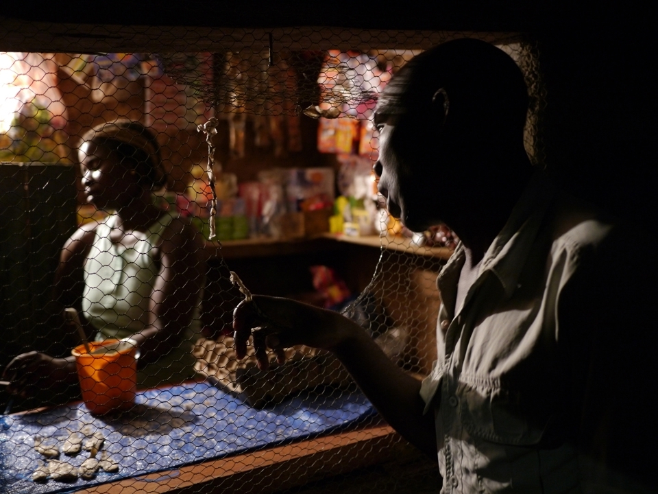 Conditions at the “25 de setembro” community are below what Vale had promised to the people when convincing them to relinquish their land. But people are resilient and find ways to thrive while the legal battle against Vale continues. A man visits a small shop, which supplies food to the community.