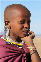 This Masai girl has followed in the footsteps of her father and brother herding the goats and cattle. School is of very little interest to her as farming is her main priority.: by angiel, Views[819]