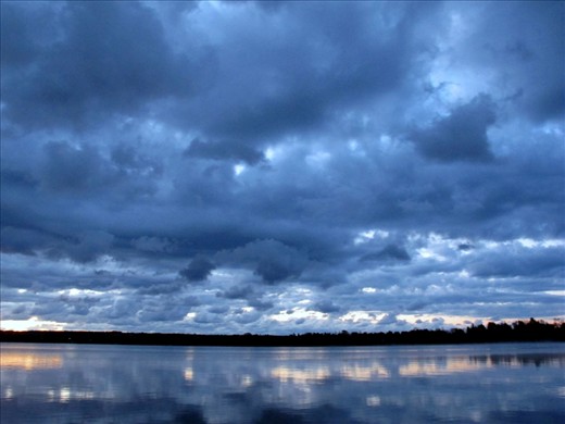 The stillness of the water, here on this quiet island, reflects only in part the depth of the sky above. The sky over Manitoulin, is the same sky over Marrakesh. We are all connected
