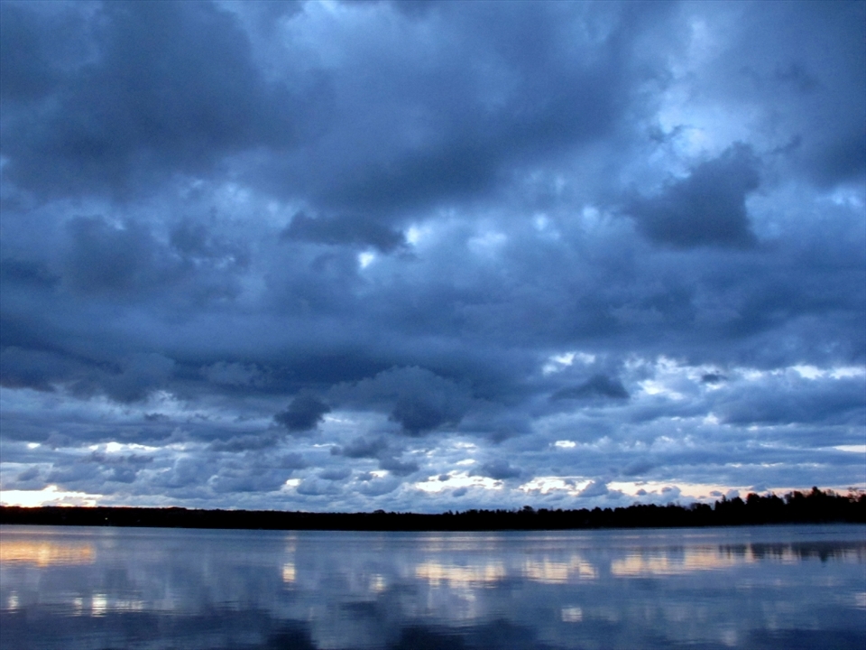 The stillness of the water, here on this quiet island, reflects only in part the depth of the sky above. The sky over Manitoulin, is the same sky over Marrakesh. We are all connected
