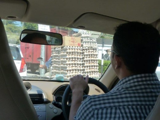 This fellow had at least 100 dozen eggs on the back of his motorbike.