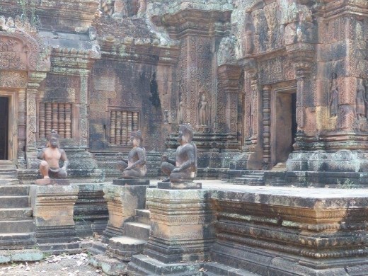 Monkey statues guarding this bit of temple, built from pink limestone