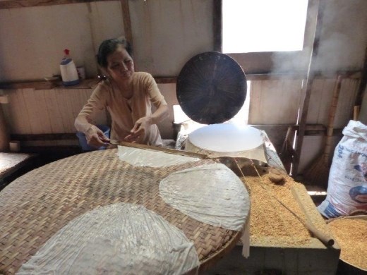 Cooking rice paper:  batter as thin as water, a hot griddle, a fire fueled by dried rice husks, and two sticks to somehow move the sheets to the drying rack
