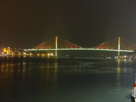 The bridge over Ha Long Bay, a changing color light show all night.