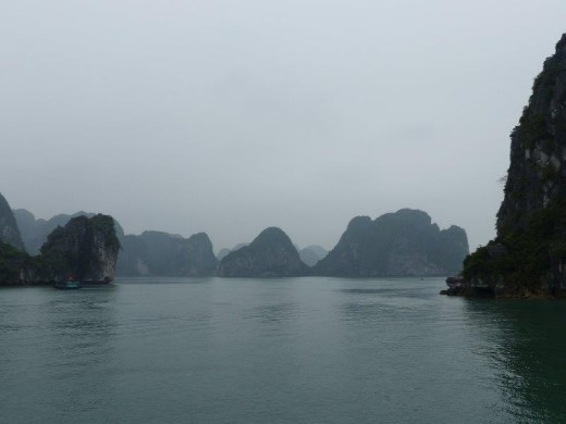 Limestone monoliths in the mist, Ha Long Bay, Vietnam
