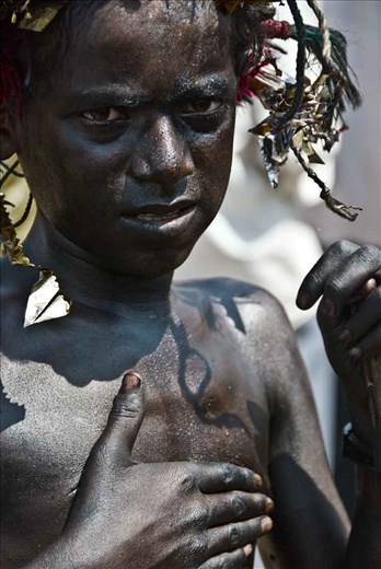 I Eat the Heat - Coated in used truck oil and grease on a scorching hot day