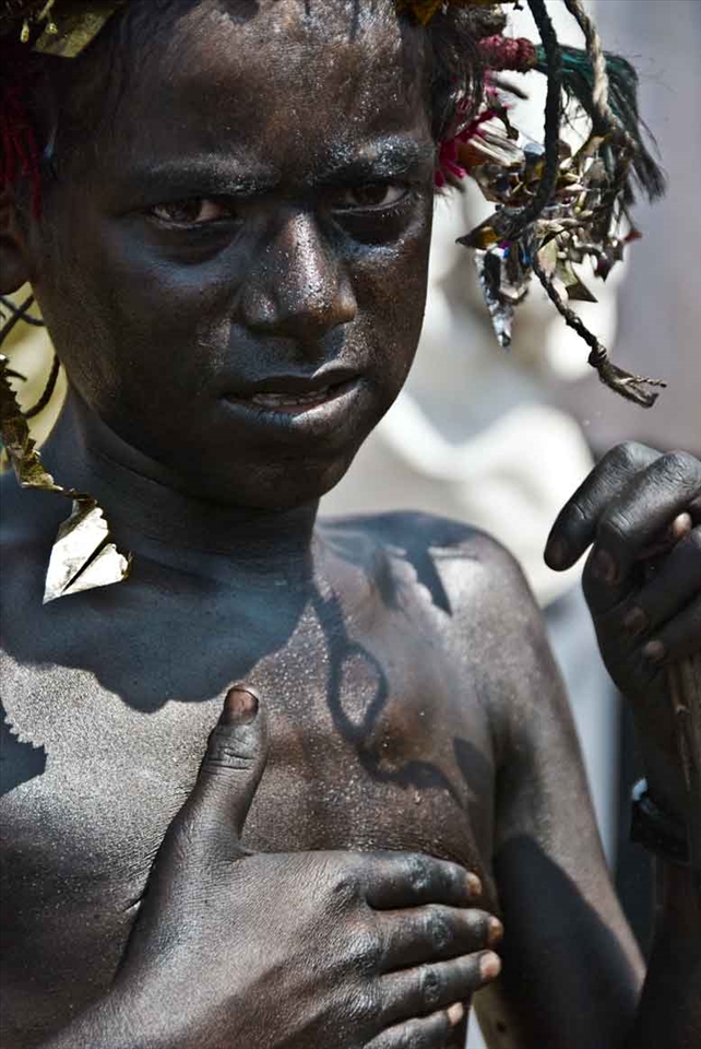 I Eat the Heat - Coated in used truck oil and grease on a scorching hot day