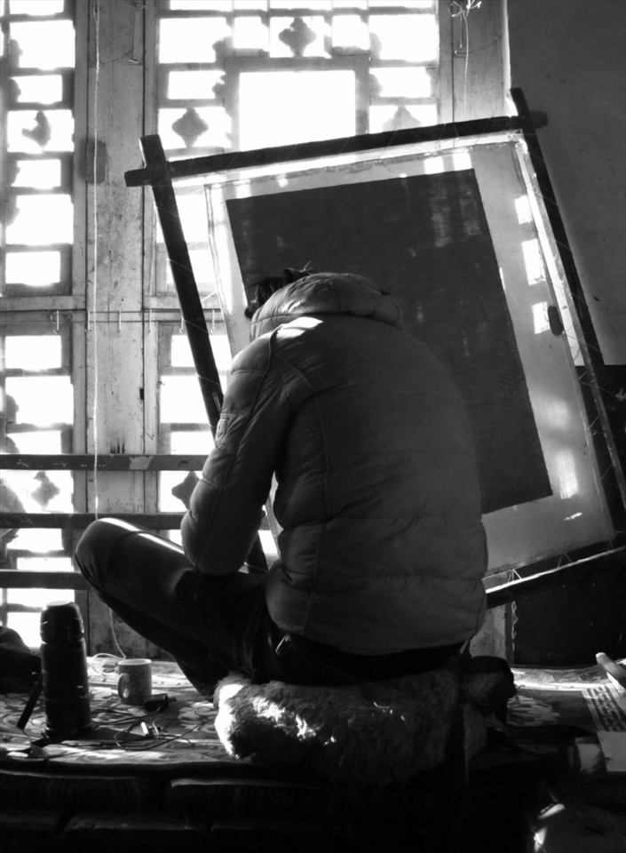 The artist:
This mandala painter works in the centre of Old Town Lhasa, in a studio with 10 others. He is a master of his craft but after 30 years of training all artists still consider themselves to be students. The mandala is the Buddhist image of life and the universe existing both within and beyond our body and mind. It depicts the paths to enlightenment – a state desired by all Buddhists, and involves all living things. 
