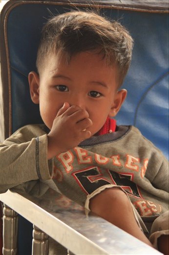 Enjoying the comfy seat til Father gets the next passenger