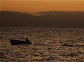 SOLITUDE AT SEA: Another show of natural wonder as the sun sets on a man still trying his luck at catching a fish while he waits to be rescued after his “tinny” went astray from the main boat during a fishing trip off Palm Island in North Queensland. Recreational fishing is a popular activity as well as a source of income for coastal communities in Queensland, according to the Great Barrier Reef Marine Park Authority. 
: by anncorvera, Views[589]