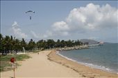 SAILING IN THE SKY: A skydiving tandem prepares to land on The Strand in the city of Townsville in North Queensland as birds line up on the beach on a typical sunny weekend. Skydiving is another popular recreational activity in the Sunshine State where a conducive climate and spectacular views of the sea and rainforests lure thousands of visitors each year. 
: by anncorvera, Views[810]