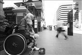 On the flip side of street life, a one-legged woman sits in silence on St. Georges Terrace in the Perth CBD. A regular around the Perth CBD, she waits for a few more charitable souls to drop coins before moving to another spot as the crowd of professionals thins after lunchbreak. : by anncorvera, Views[1180]