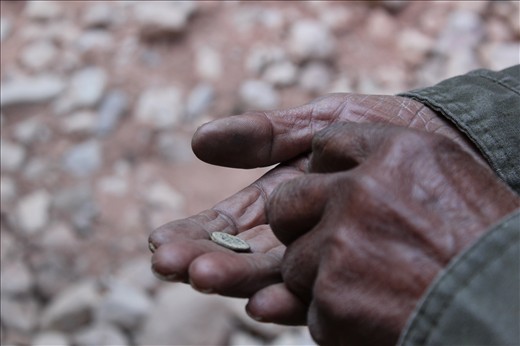 Our guide told us that this man was one of the last remaining residents of Petra.  His aged hands held an old coin from Petra that he sold to one of our group members.

(unedited.)
