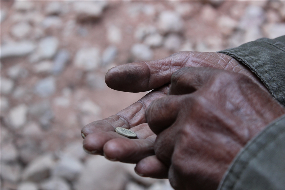 Our guide told us that this man was one of the last remaining residents of Petra.  His aged hands held an old coin from Petra that he sold to one of our group members.

(unedited.)