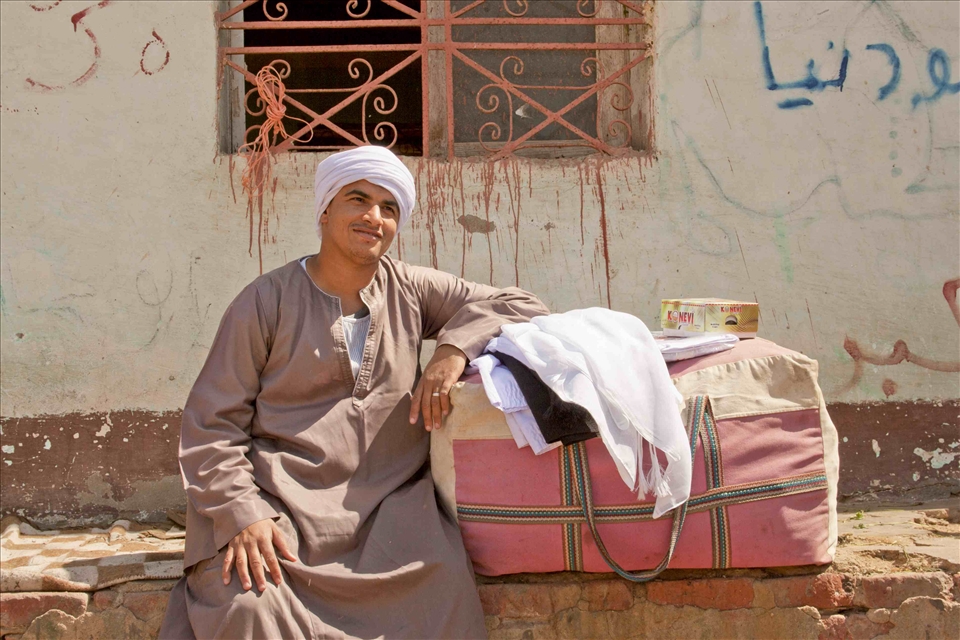 you can find some people selling goods to the visitors of the Camels market