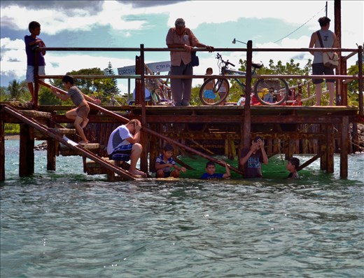 Arriving with a small boat to a small village.