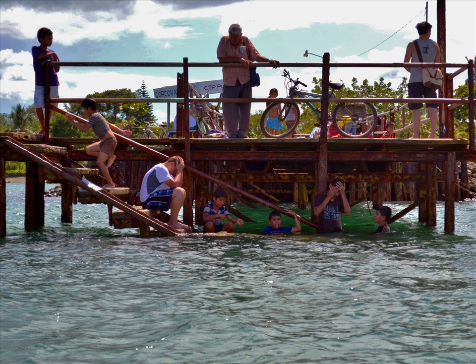Arriving with a small boat to a small village.