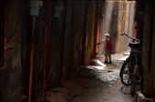 The life inside the walled city of Lahore has a taste of its own. It is so serene yet so busy. I stood at the end of this street, attracted by the wonderful light and ambiance; seeing the hawkers pass by, garbage man collecting garbage on his bicycle and children running errands for their mothers.: by anwarsrosh, Views[1667]