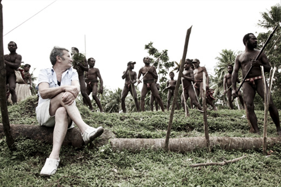Demonstrating their masculinity and strength, Vanuatu men chant during a yam harvest and fertility ritual, an annual custom of the Pentecost people. Looking on, sits a mature Caucasian man with his legs femininely crossed. Our world has evolved, adapted and changed. The lines of gender have been crossed and blurred. Men can be more feminine than women; women more masculine than men. Does this exclude a place like Pentecost? Or is it still a secret?