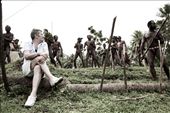 Demonstrating their masculinity and strength, Vanuatu men chant during a yam harvest and fertility ritual, an annual custom of the Pentecost people. Looking on, sits a mature Caucasian man with his legs femininely crossed. Our world has evolved, adapted and changed. The lines of gender have been crossed and blurred. Men can be more feminine than women; women more masculine than men. Does this exclude a place like Pentecost? Or is it still a secret?: by aplaceivisited, Views[1329]