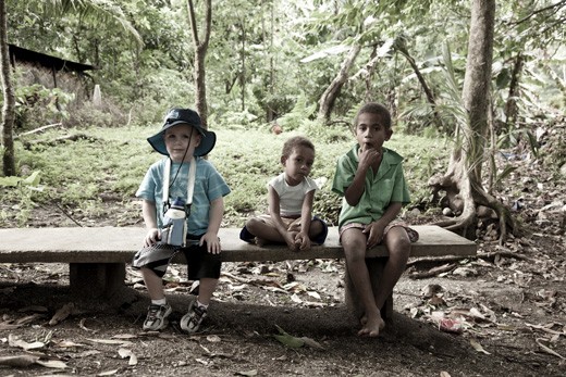 What makes someone rich? Three children sit side-by-side along a bench. One is fully clothed, sporting shoes, hat and water bottle; the other two sitting with none. In a world where material things and possessions mean so much, Pentecost Island reminds us all that we are equal. No matter your wealth, age, gender or skin colour. 