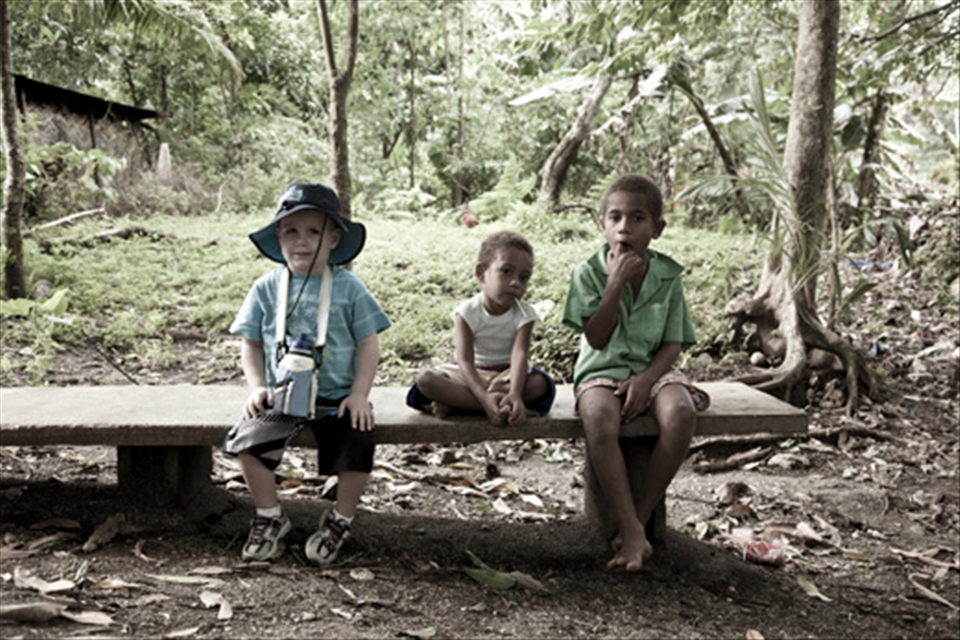 What makes someone rich? Three children sit side-by-side along a bench. One is fully clothed, sporting shoes, hat and water bottle; the other two sitting with none. In a world where material things and possessions mean so much, Pentecost Island reminds us all that we are equal. No matter your wealth, age, gender or skin colour. 
