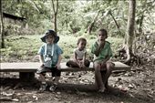 What makes someone rich? Three children sit side-by-side along a bench. One is fully clothed, sporting shoes, hat and water bottle; the other two sitting with none. In a world where material things and possessions mean so much, Pentecost Island reminds us all that we are equal. No matter your wealth, age, gender or skin colour. : by aplaceivisited, Views[1117]