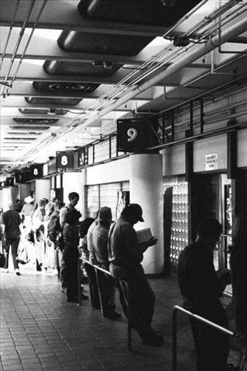 Daily commuters wait for their bus home to Boulder