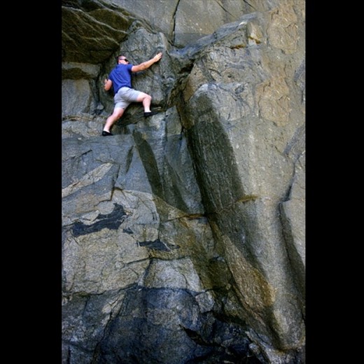 A portrait shot of the rock climbing that the Natural Bridge in Albany has to offer. It details the beautiful colours that can be seen in the rock formations. Rock climbing at the gap is not recommended for general people of the public, professionals only.
