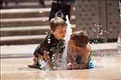 Children were having fun with the water fountains in the streets of Glenleg Beach area, Adelaide.: by arefin, Views[404]