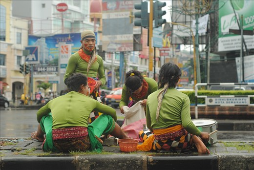 Semarang is a capital city of Central Java region in Indonesia. There, I found this traditional artist group on a rainy day. Named ‘Jaran Eblek’ that means Crazy Horse, this group usually make a show on an inter-junction traffic light. This group has 4 members, two men work on music and two others  have to dance and collect money around the street.
