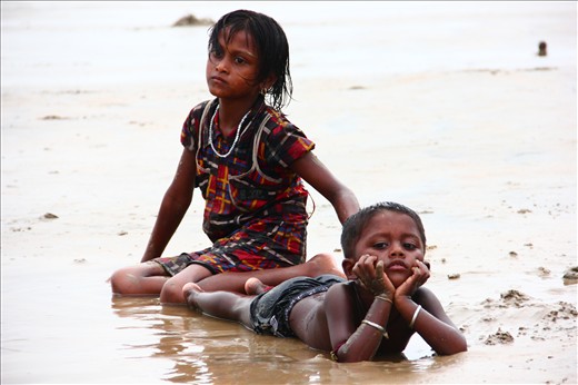 Local children are playing in sea beach