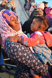 A grandma and a grand daughter are waiting until the sun rises. The little one one wants to play with grandma.: by arugambay, Views[761]