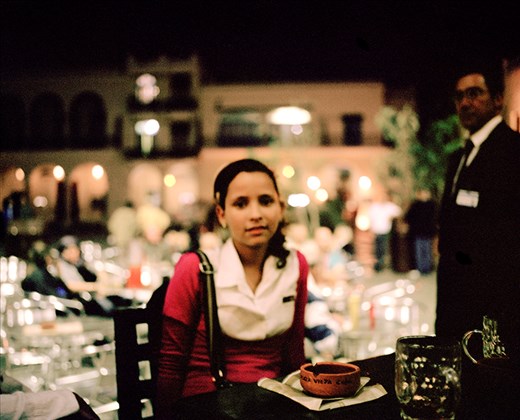 A young girl keeps me company and shares her fantasies of leaving the island.