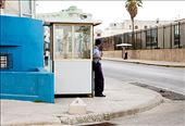 An officer stands guard, listlessly outside of the United States embassy.: by asanchez1990, Views[316]