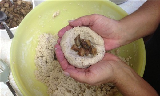 Adding the pork filling