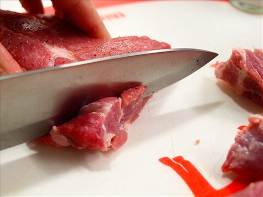 Slicing the pork butt.