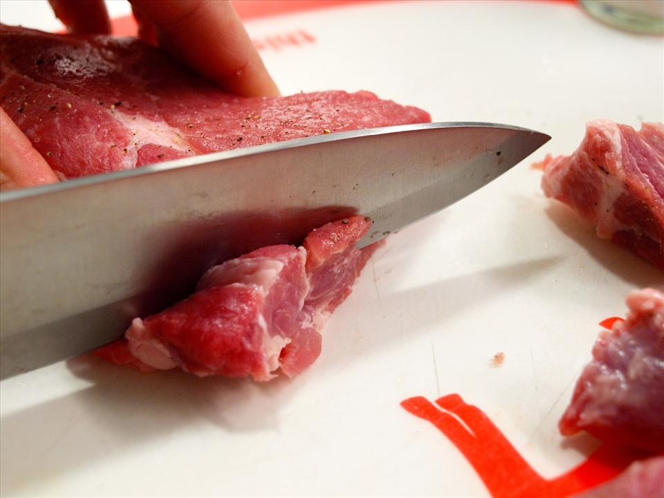 Slicing the pork butt.