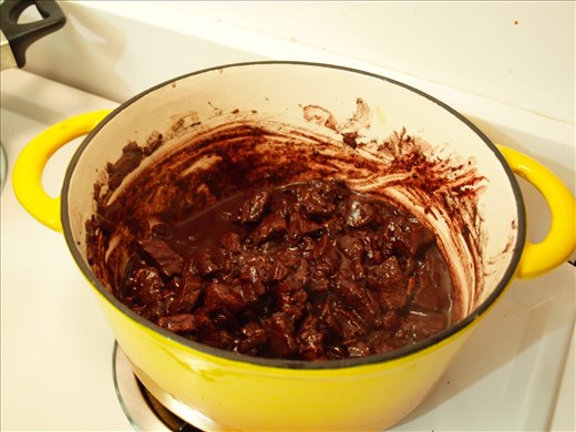 The sauce should begin to look chocolatey.