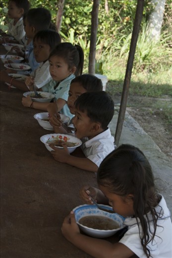 The pre-schoolers start their day with breakfast before learning how to brush their teeth. 