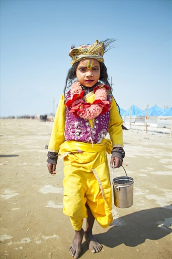 kid dressed up as Krishna - kumbh mela  