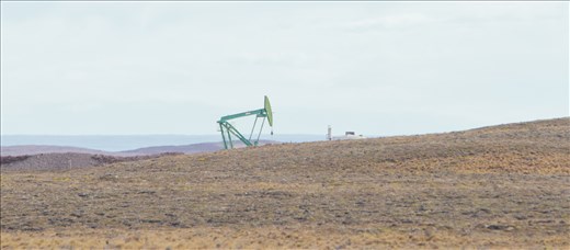 Tierra del Fuego bears the scars of natural gas and petroleum exploration.   Chile has always been nervous about its reliance on neighbouring countries, particularly Argentina, for it's non-renewable energy resources.  

From the 1940's Tierra del Fuego accounted for the vast majority of Chile's fossil fuel production and was considered particularly important at the time as renewable energy sources, which have now become a significant and sustainable source of Chile's energy, were far less developed.  From the regions economic heyday in the mid to late twentieth century the countries focus on renewable energy and less productive reserves have reduced the physical presence of this part of the regions past.  However its legacy is still very visible, as you can see from this image of one of the many remaining on-shore oil wells.