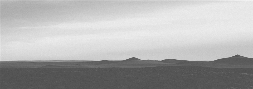 Just across Magellan's Strait lies the Pali Aike volcanic area, a reminder of the impressive natural forces which have shaped the local landscape.  While millenia of erosion has left only remnants of volcanic activity behind in this particular site, with the Andes mountains nearby it's a poignant reminder of how small incremental changes, as simple as erosion from rain can, over timescales of such length to be unrecognisable to humans, reduce thousands of metres of mountains to the landscapes seen in this image.