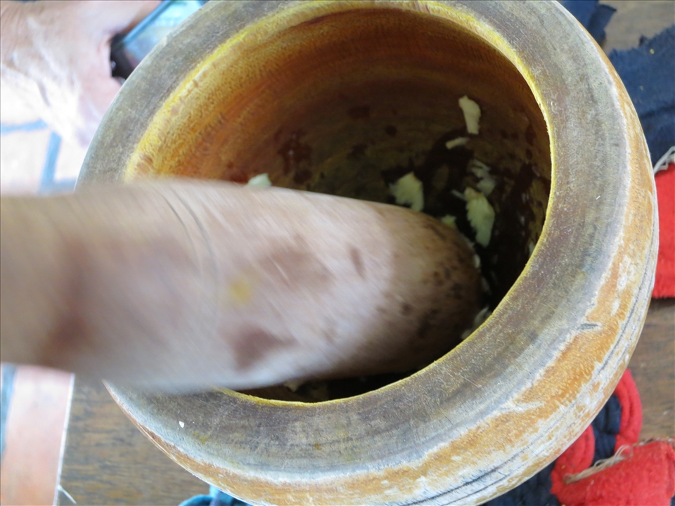 It is no easy feat by hand, but can also be done in a food processor. 